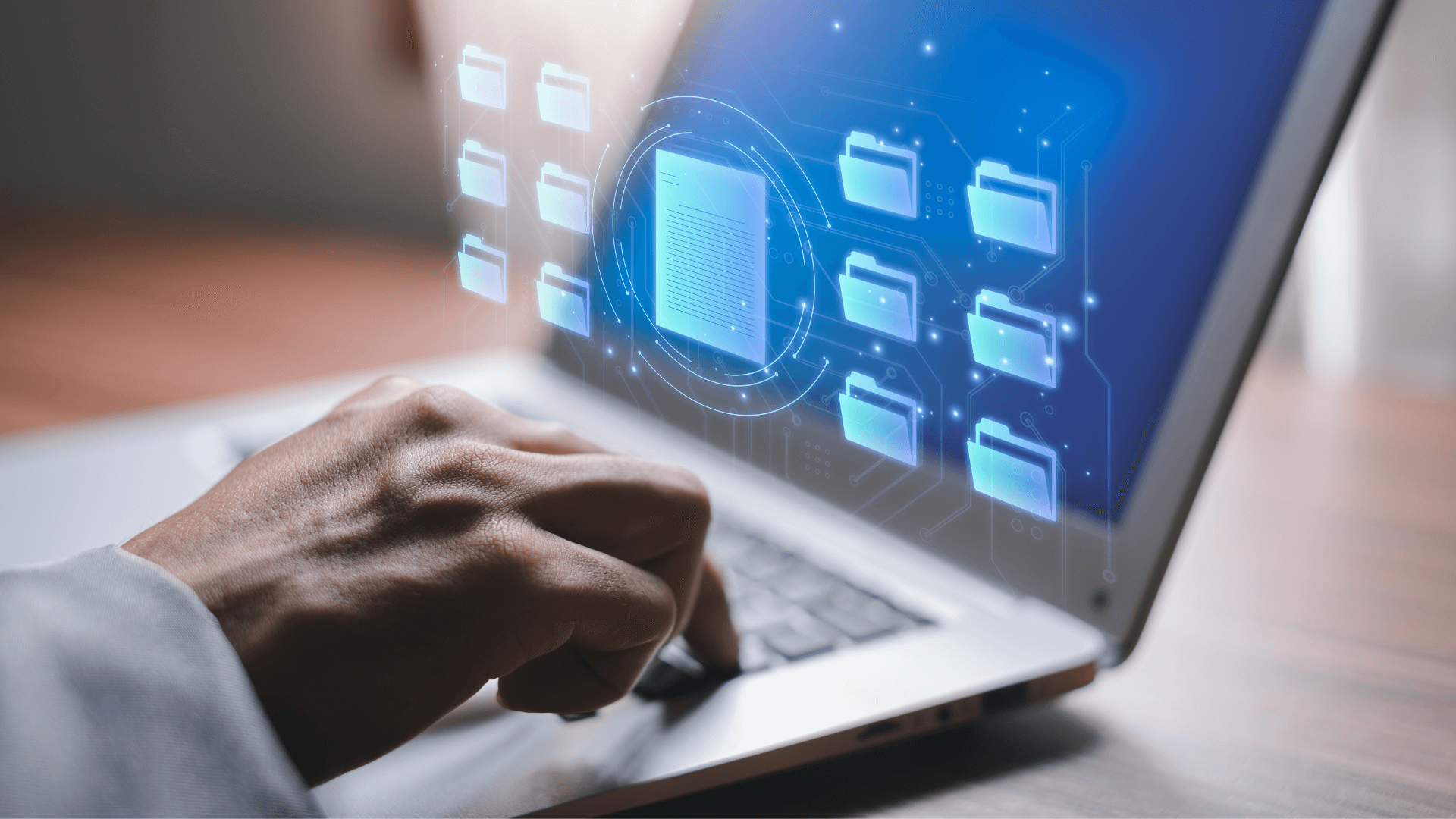 A person accessing a document through a laptop