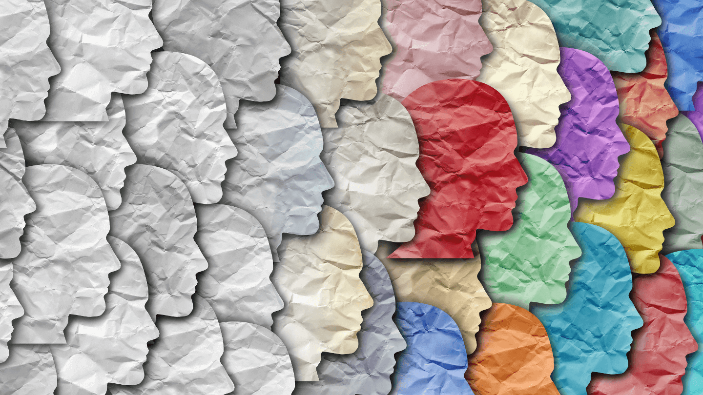 A paper shaped human faces differentiate by colors