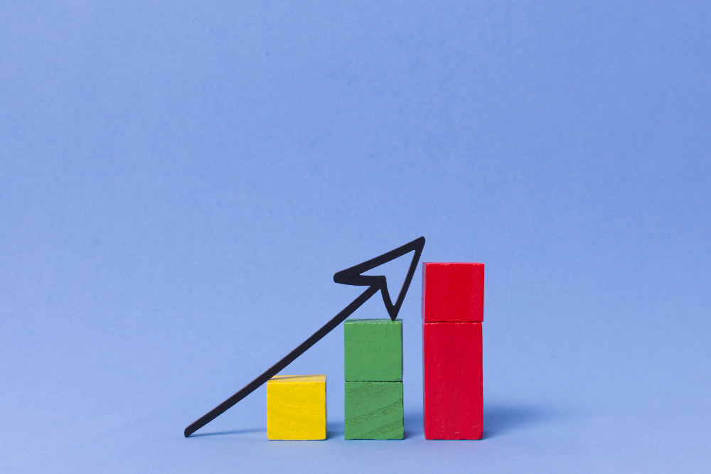 Three blocks that differs in height with an upward arrow