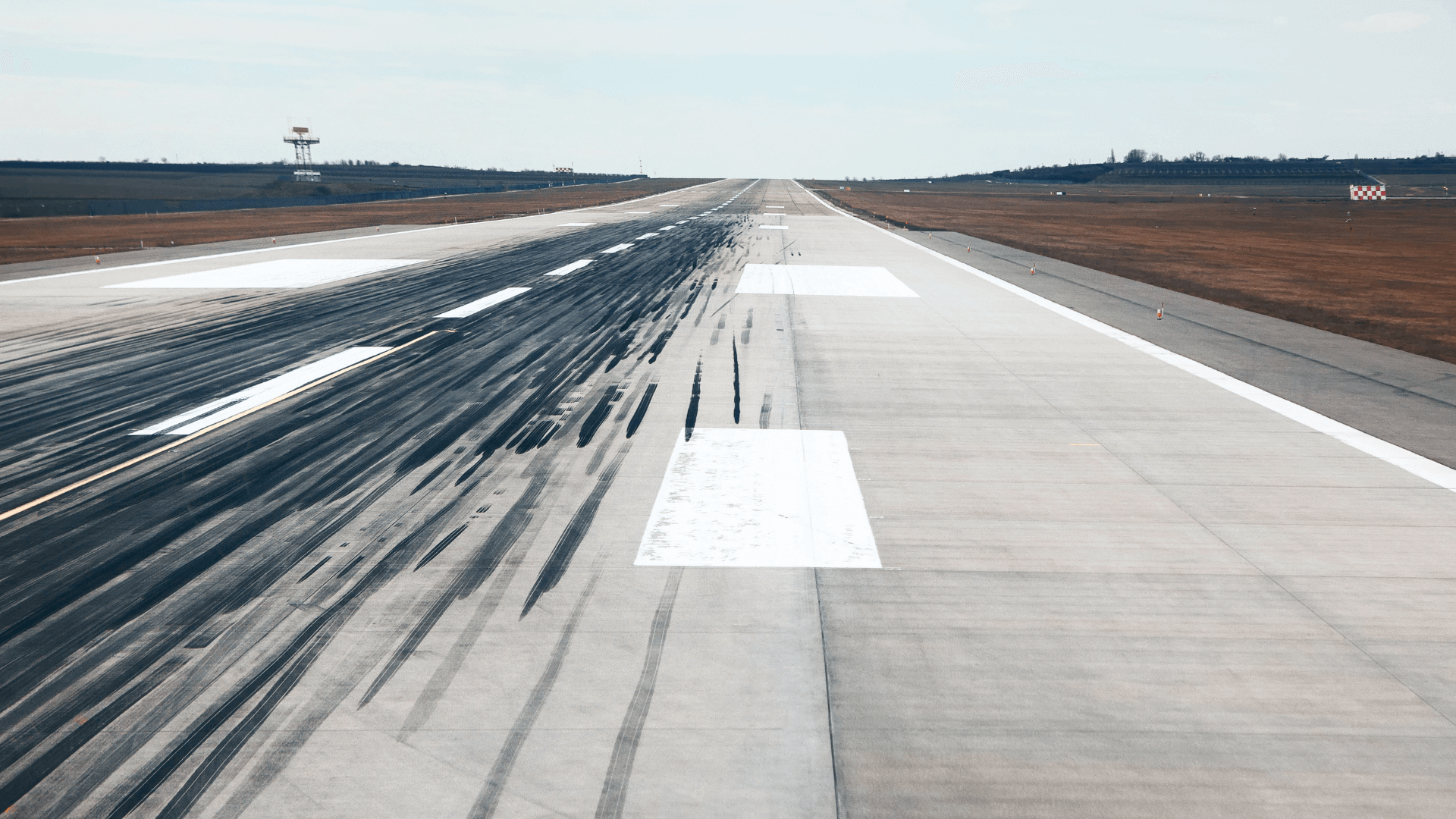 A view of a plane's landing spot with leaving a tire's trail