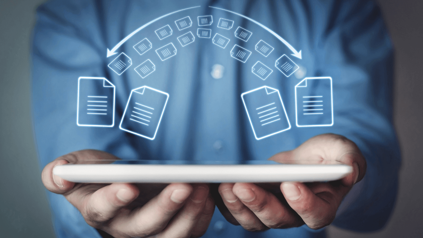 An image of a person holding a tablet with illustration of exchanging documents