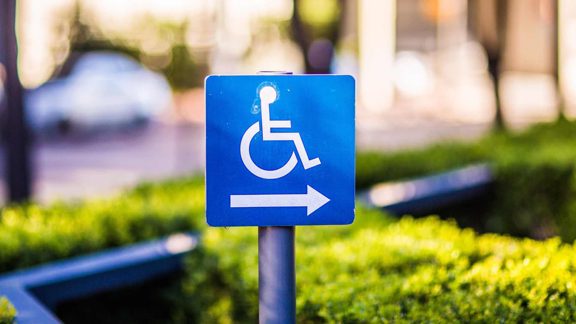 An image showing a PWD signage with an arrow pointing to the right